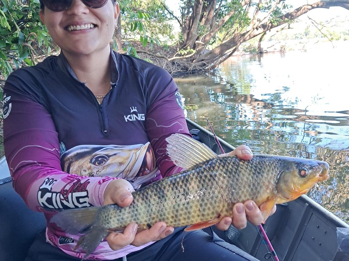 Pescadora celebrando mais uma espécie do Teles Pires